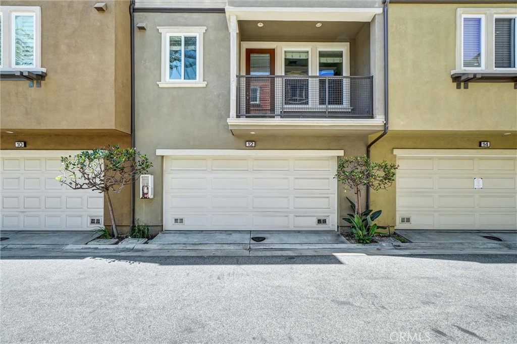 12 Shellprint Court Newport Beach, CA 92663 - Photo 5 of 42 Attached two-car Garage with direct access to downstairs office/bedroom and to staircase to upstairs living area