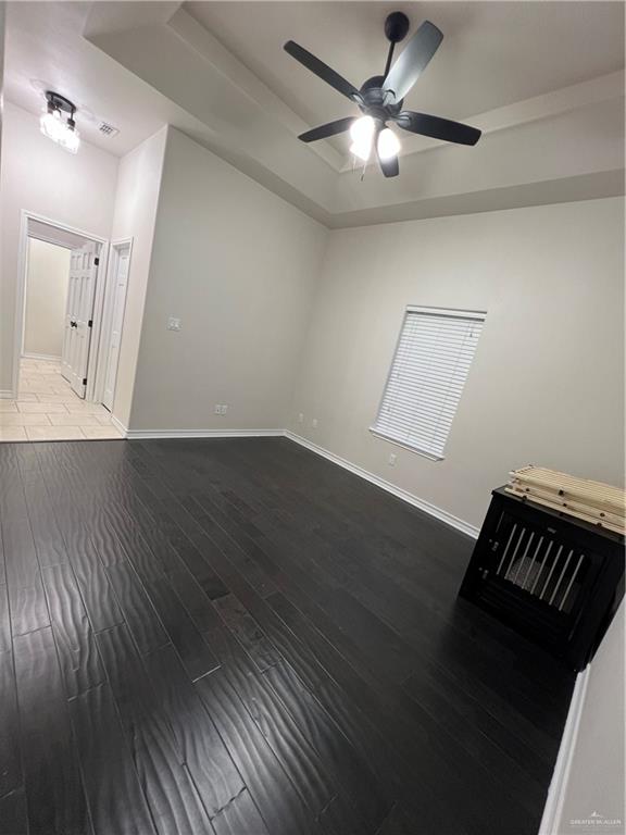 5809 North 3rd Street McAllen, TX 78504 - Photo 13 of 18 wooden floor in an empty room with a window