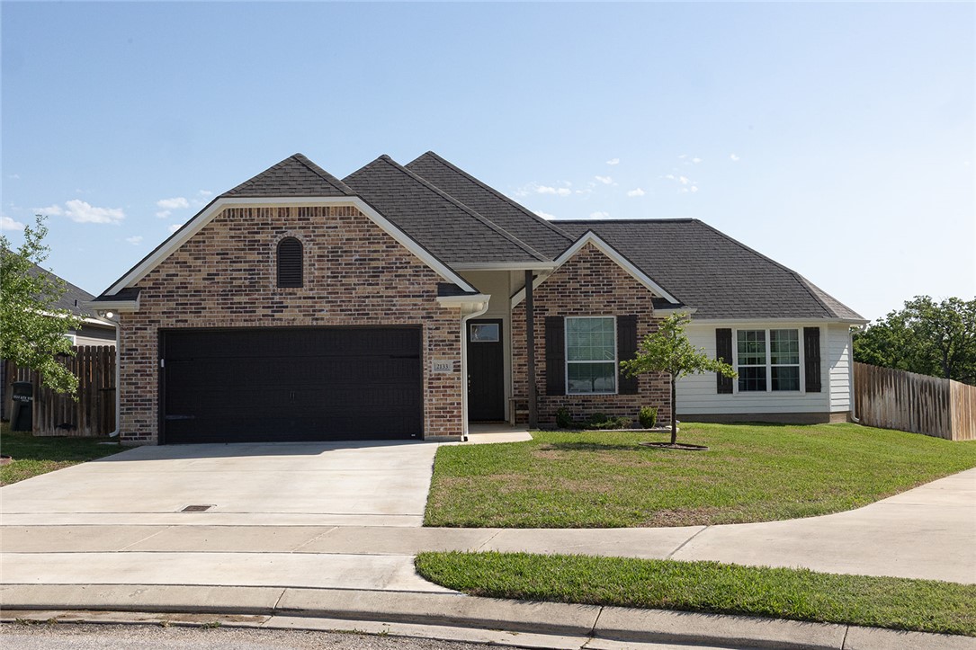 2133 Mountain Wind Loop Bryan, TX 77807 - Photo 1 of 1 View of front of house featuring concrete driveway