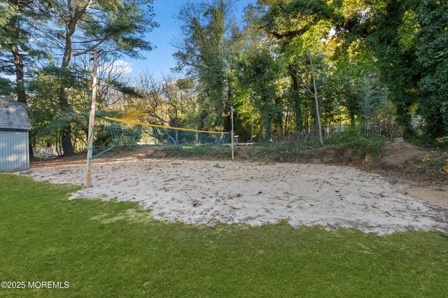 a view of a backyard with trees