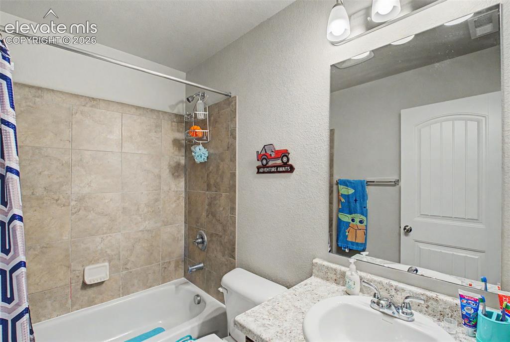 10957 Avena Road Peyton, CO 80831 - Photo 26 of 34 Second full bathroom on upper level