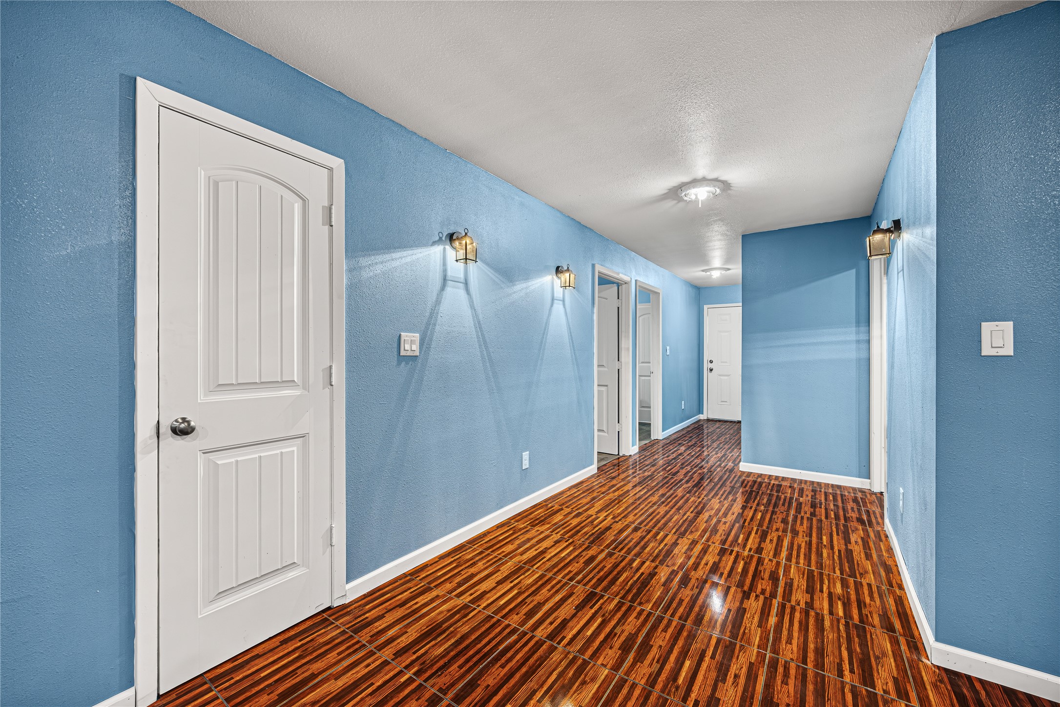 235 Bracewell Cemetery Road Livingston, TX 77351 - Photo 13 of 37 a view of a hallway with wooden floor