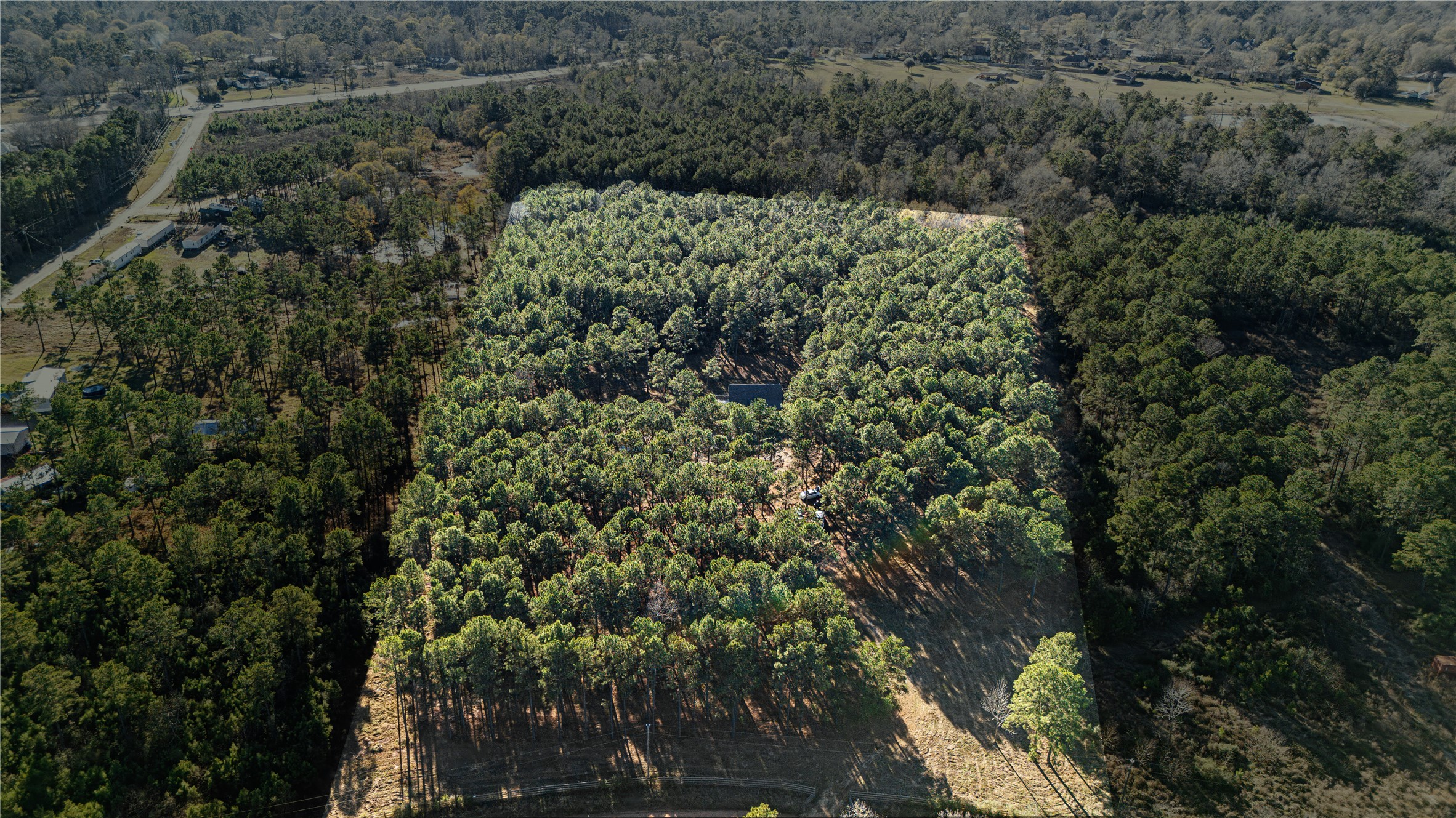 235 Bracewell Cemetery Road Livingston, TX 77351 - Photo 30 of 37 an aerial view of a house with a yard