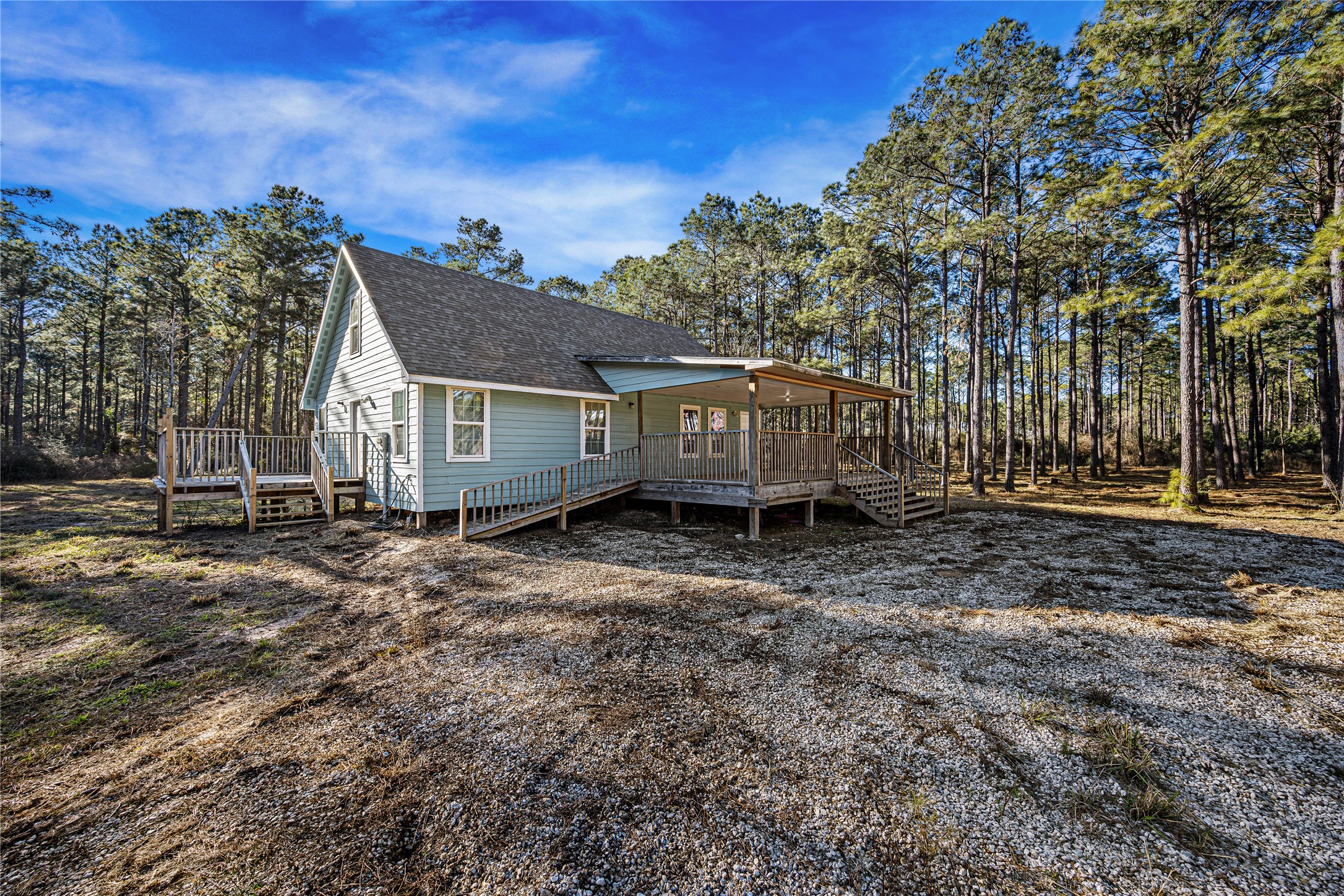 235 Bracewell Cemetery Road Livingston, TX 77351 - Photo 4 of 37 a view of a house with a yard