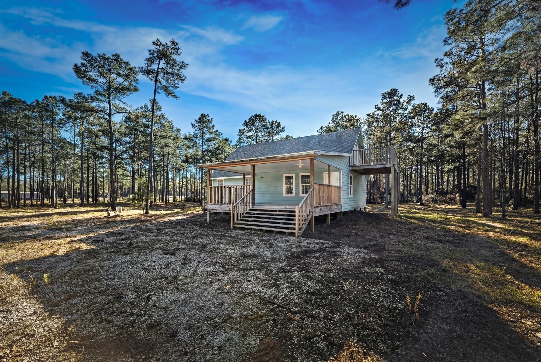 235 Bracewell Cemetery Road Livingston, TX 77351 - Photo 5 of 37 a view of a house with a yard