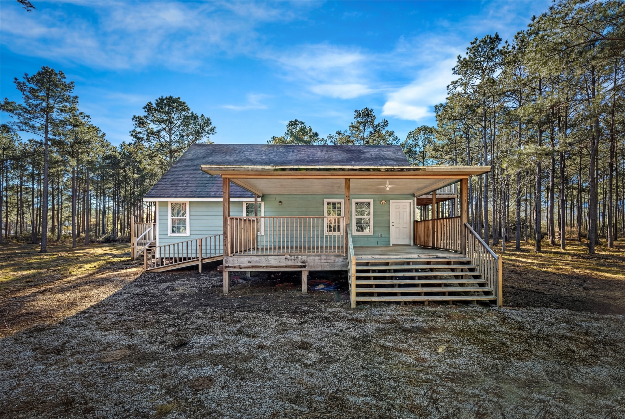 235 Bracewell Cemetery Road Livingston, TX 77351 - Photo 6 of 37 a view of a house with a yard