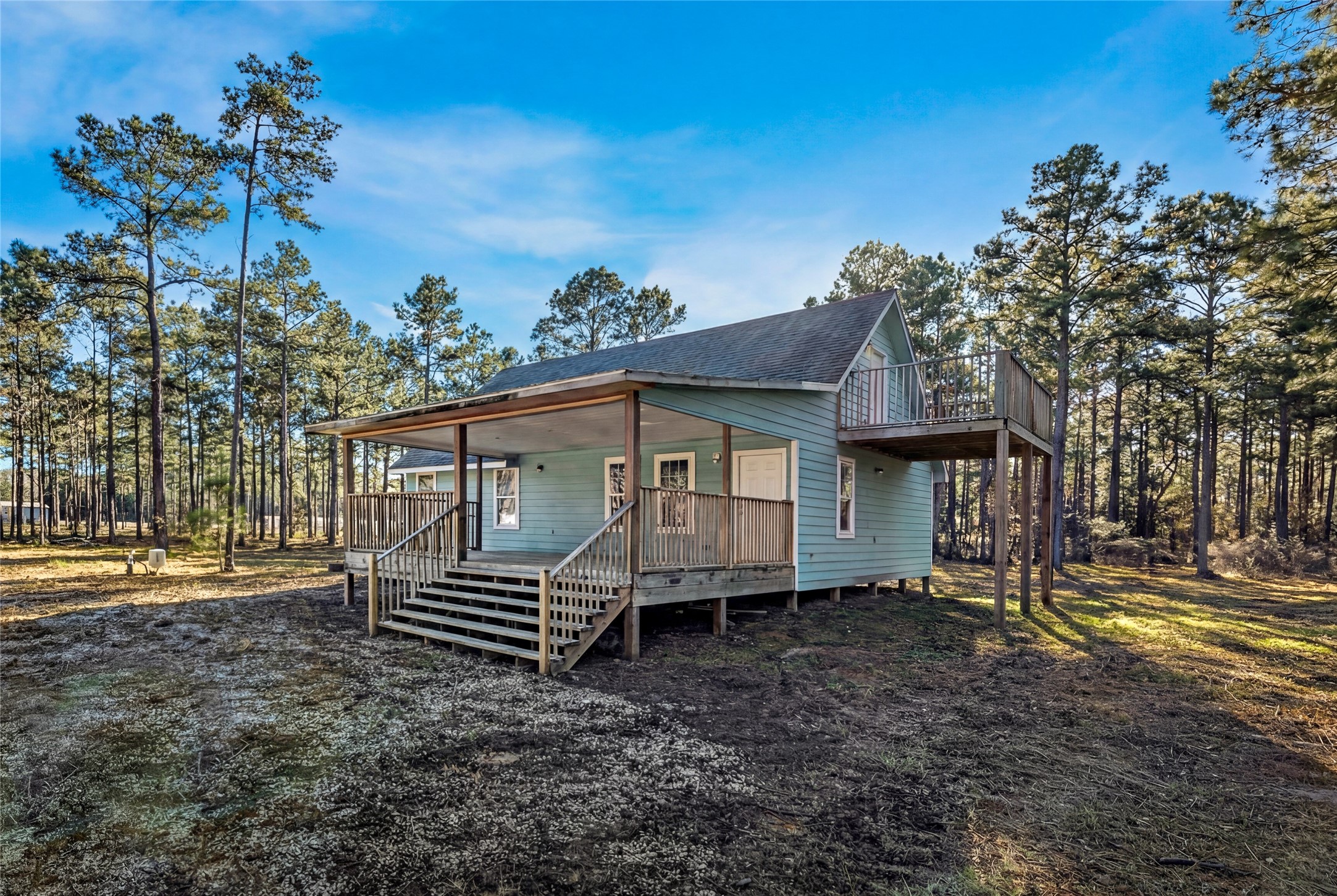235 Bracewell Cemetery Road Livingston, TX 77351 - Photo 7 of 37 a view of house with a outdoor space