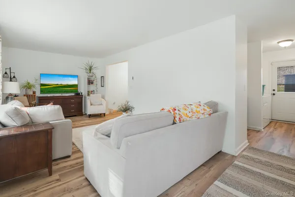 a living room with furniture and a couch