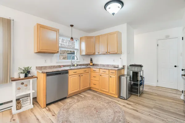 a kitchen with stainless steel appliances granite countertop a stove and a sink with granite countertops