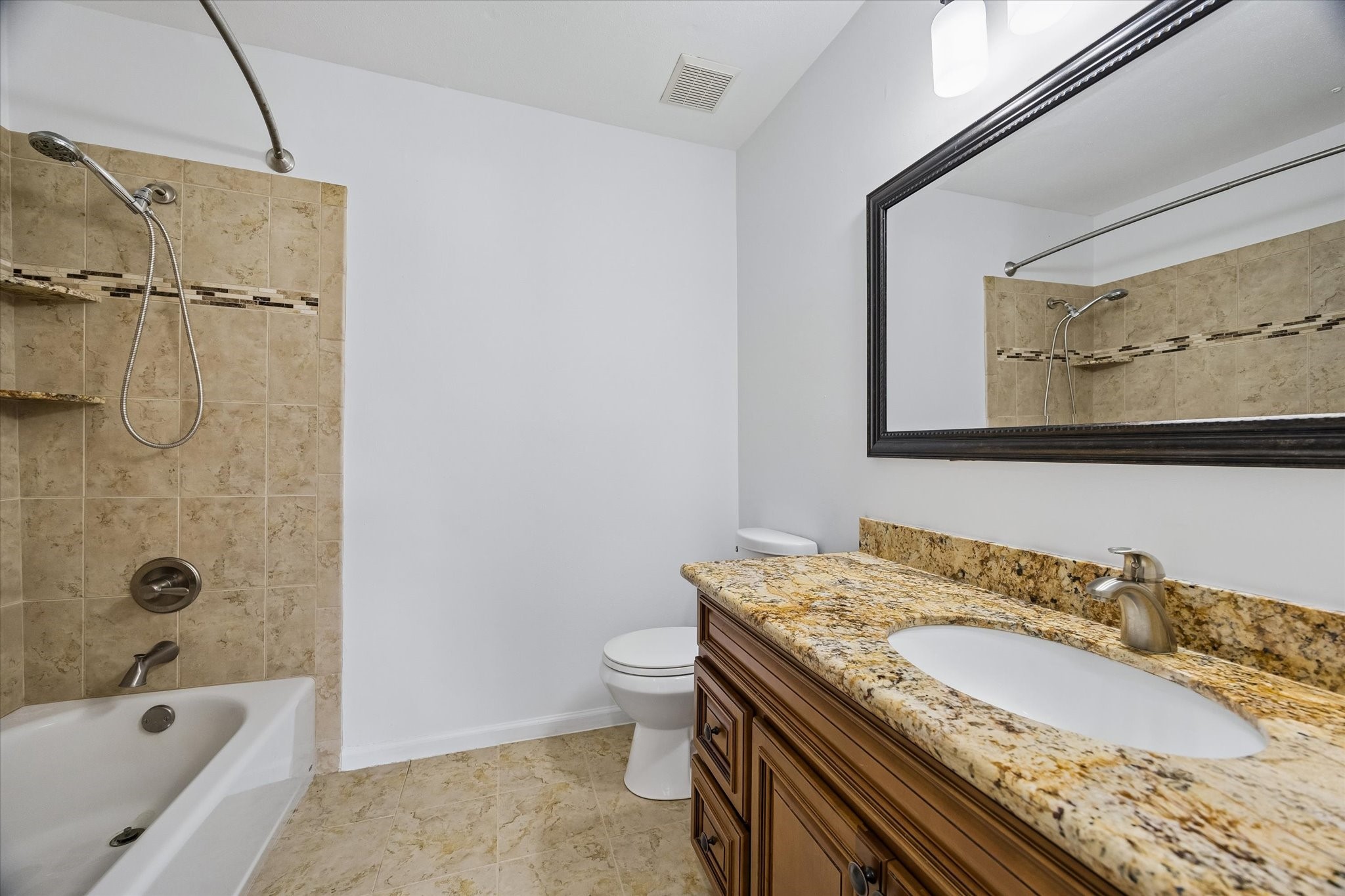 752 Augusta Drive, Unit 752 Houston, TX 77057 - Photo 15 of 19 Second bathroom shared by two upstairs guest bedrooms.