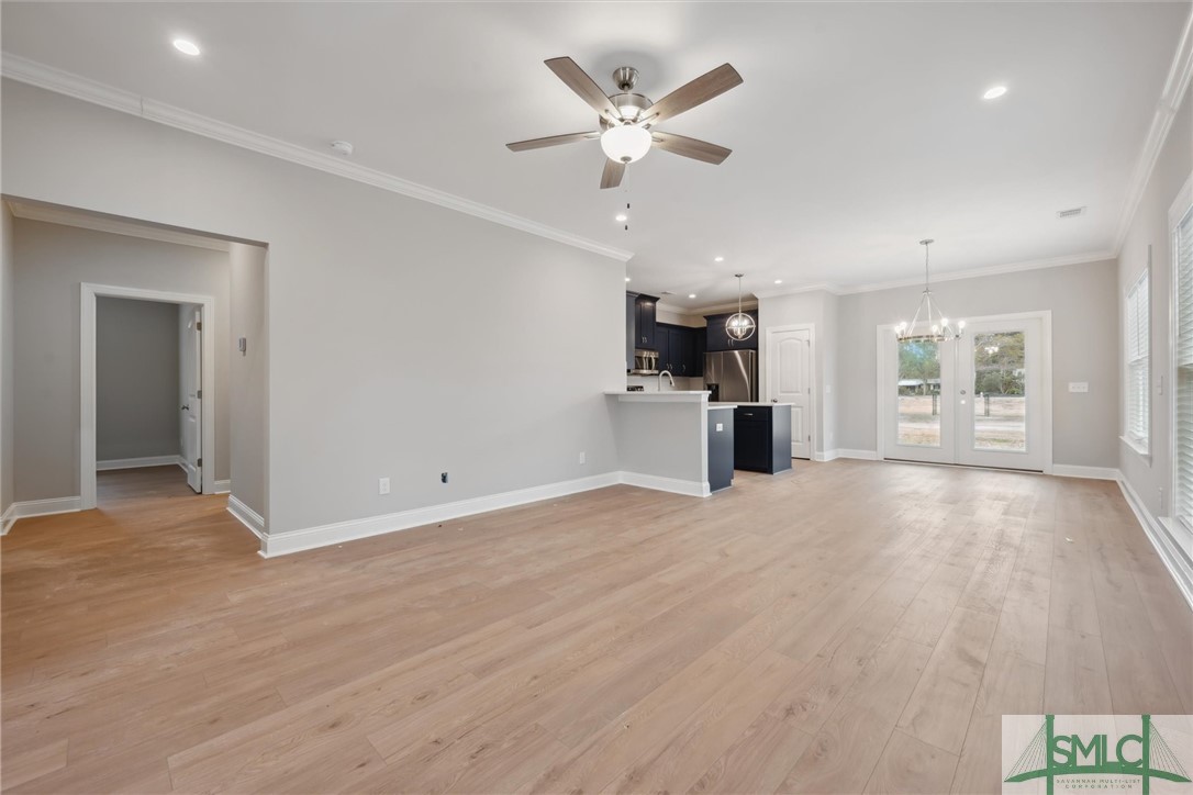 102 Owens Road Pembroke, GA 31321 - Photo 13 of 37 Refreshing lighted ceiling fan.