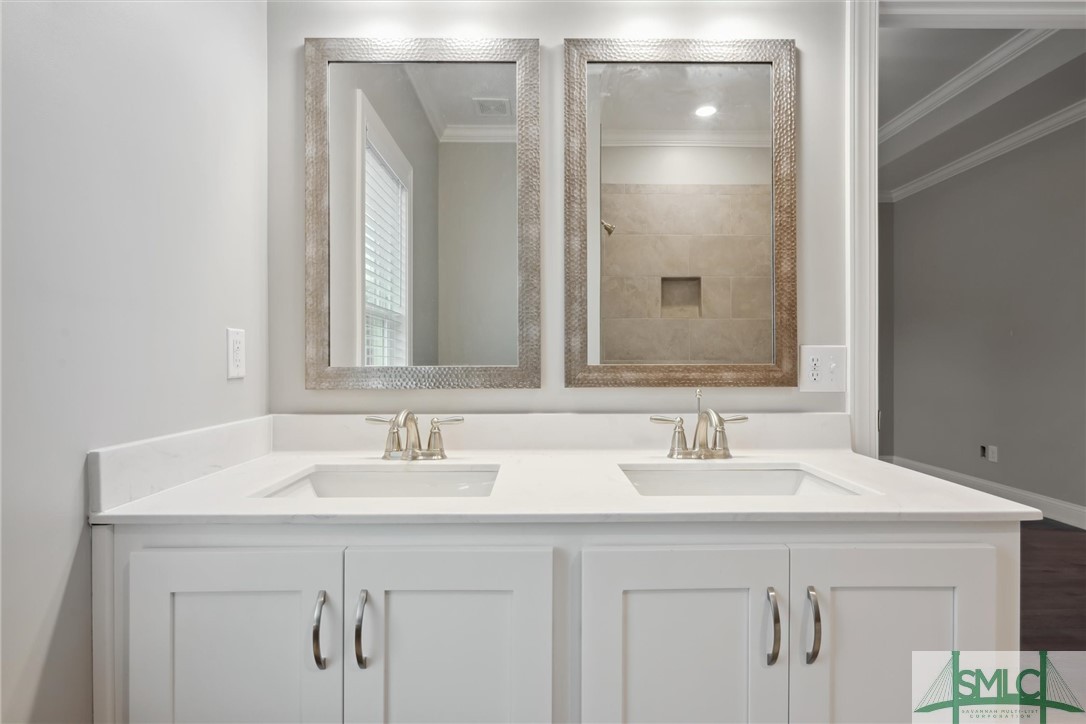 102 Owens Road Pembroke, GA 31321 - Photo 20 of 37 Upgraded counters and framed mirrors.