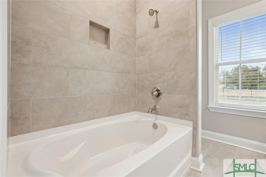 102 Owens Road Pembroke, GA 31321 - Photo 21 of 37 Shower over tub and beautiful tile.