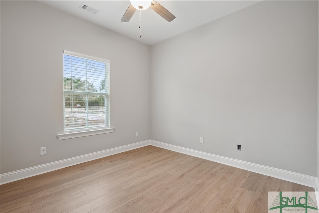 102 Owens Road Pembroke, GA 31321 - Photo 24 of 37 Lighted fan & LVP flooring.