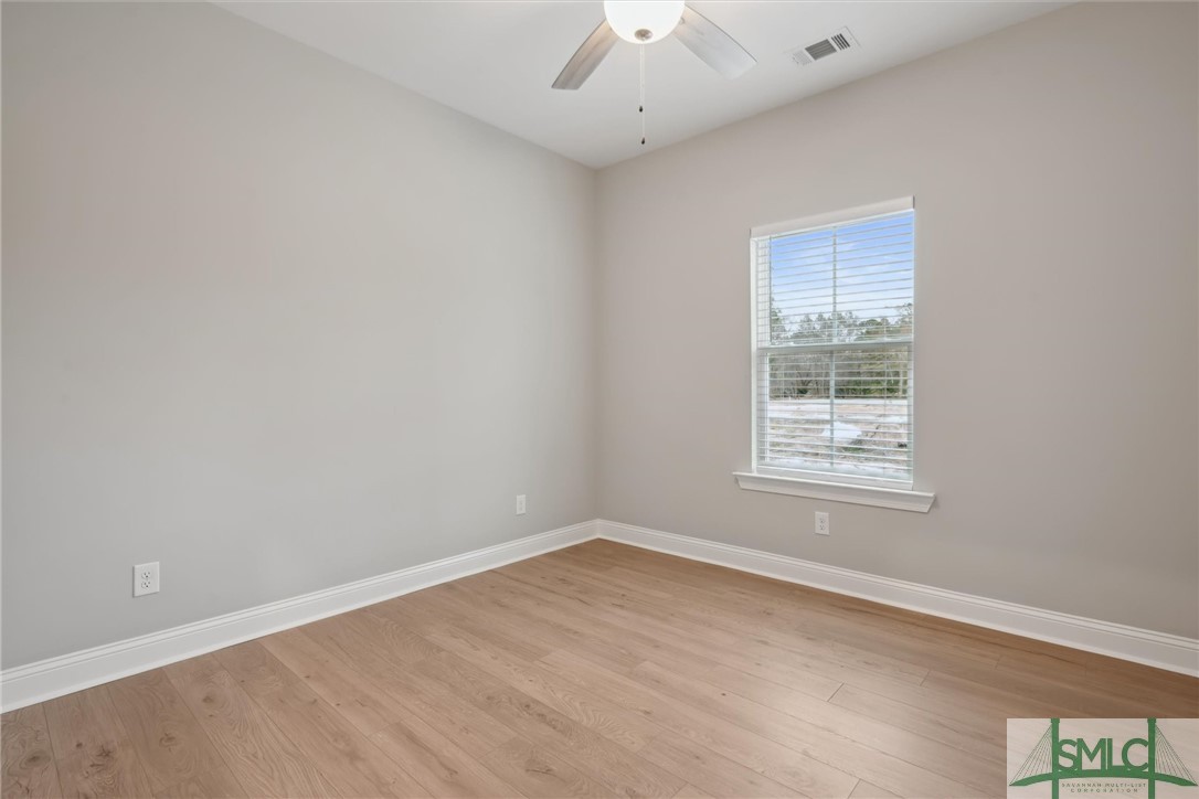 102 Owens Road Pembroke, GA 31321 - Photo 28 of 37 Lighted fan & LVP flooring.