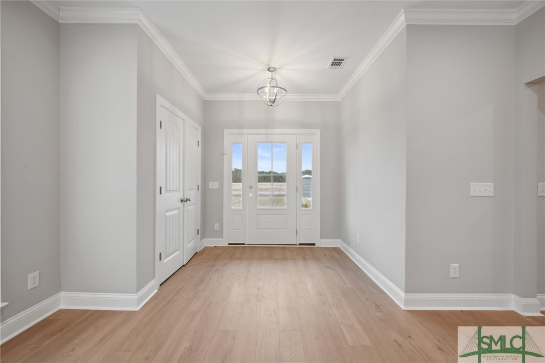 102 Owens Road Pembroke, GA 31321 - Photo 3 of 37 Foyer entryway with double door closet.