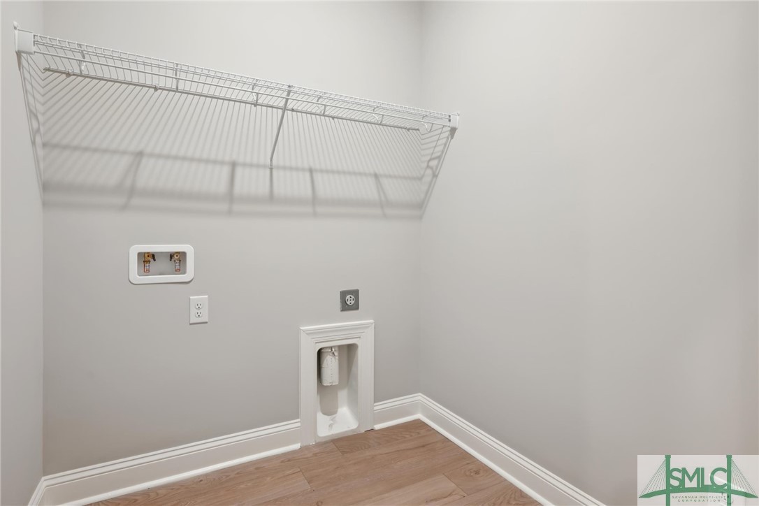 102 Owens Road Pembroke, GA 31321 - Photo 30 of 37 Laundry room with LVP flooring.