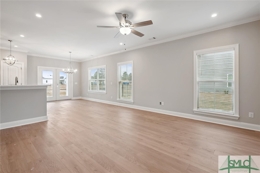 102 Owens Road Pembroke, GA 31321 - Photo 4 of 37 Great room with abundant windows and natural light