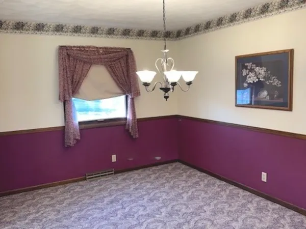 a view of a livingroom with a fan