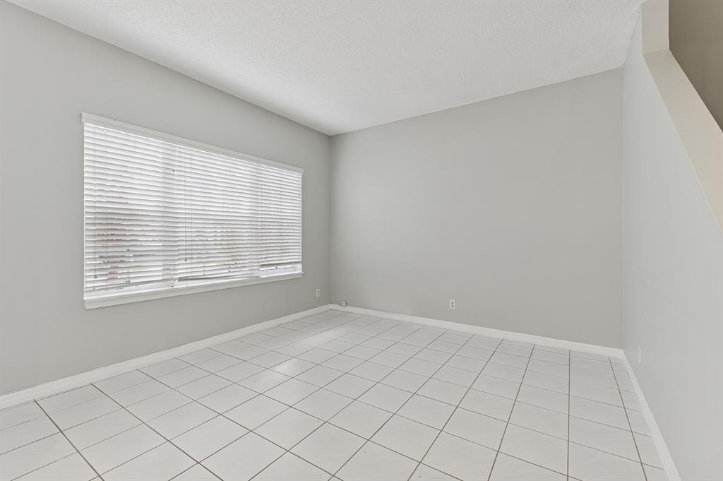 6007 Red Plum Court, Unit 465 Tamarac, FL 33321 - Photo 3 of 23 a view of an empty room with a window