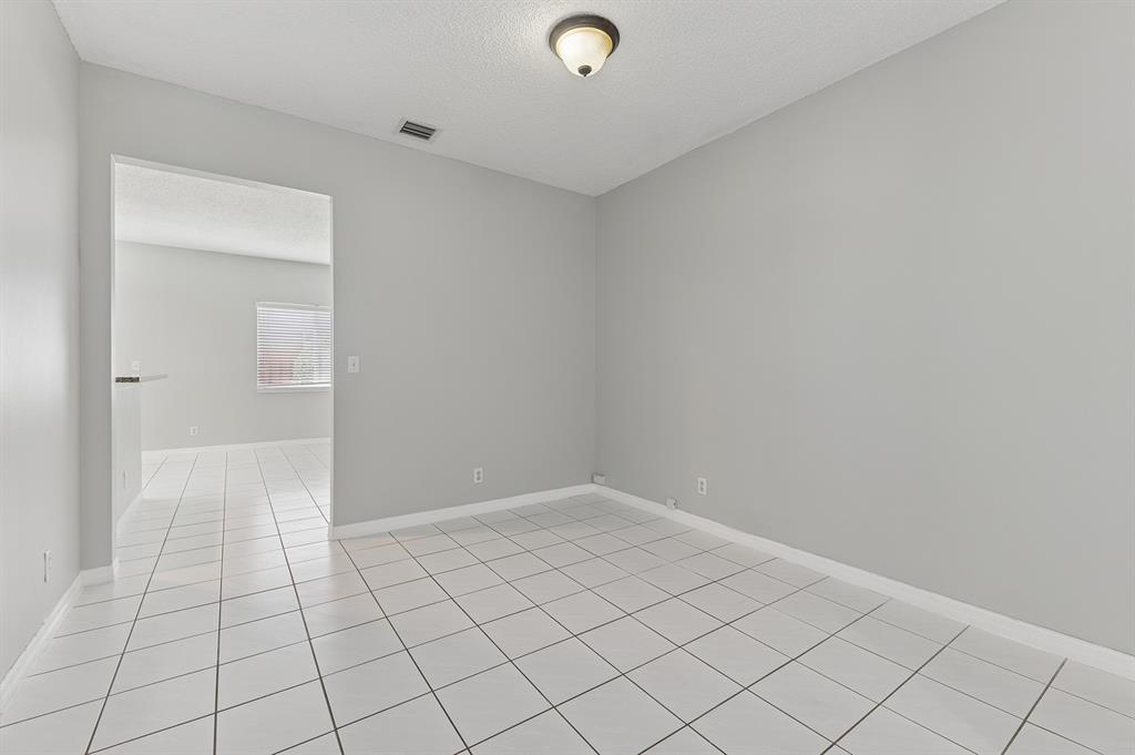 6007 Red Plum Court, Unit 465 Tamarac, FL 33321 - Photo 5 of 23 a view of an empty room