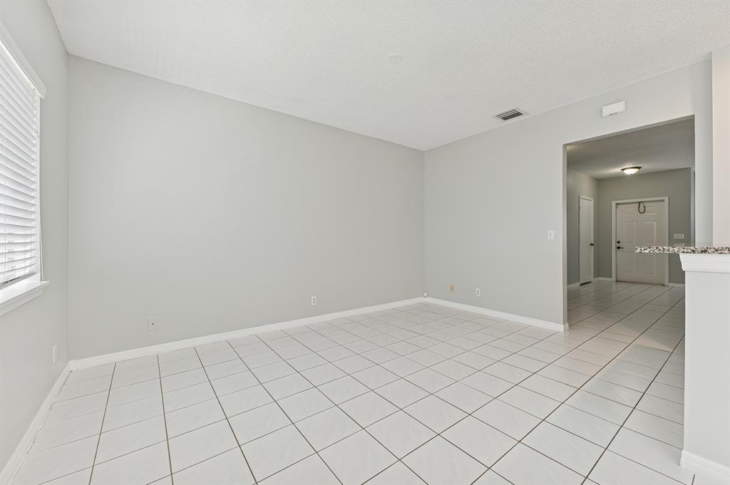 6007 Red Plum Court, Unit 465 Tamarac, FL 33321 - Photo 8 of 23 a view of an empty room and window