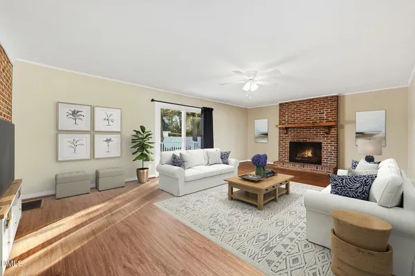 a kitchen with stainless steel appliances a cabinets and a wooden floor