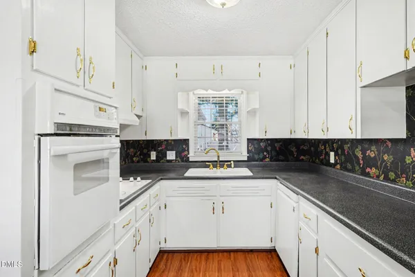 a view of a livingroom with wooden floor