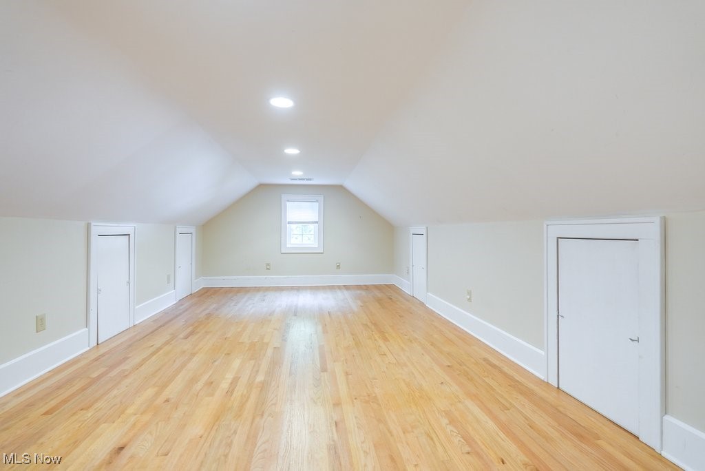 2980 Luli Road Mogadore, OH 44260 - Photo 45 of 50 bedroom featuring light hardwood / wood-style floors and lofted ceiling