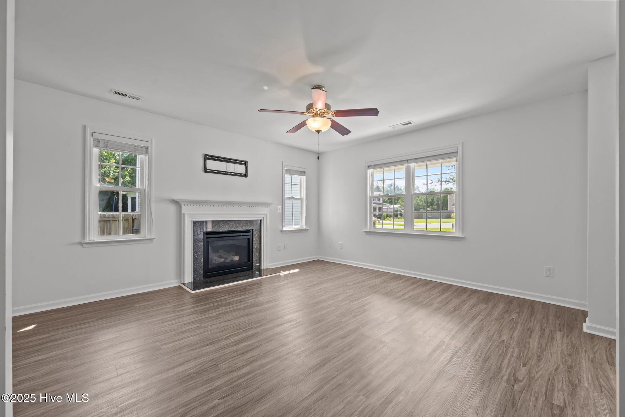 331 First Post Road Jacksonville, NC 28546 - Photo 8 of 55 Living Room w/ Gas Log Fireplace