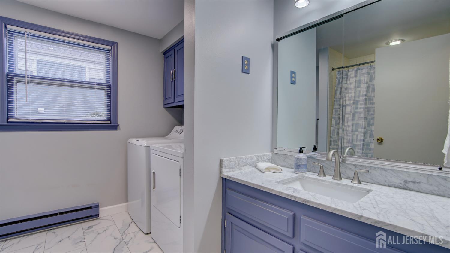 337A Old Nassau Road, Unit A Monroe Township, NJ 08831 - Photo 21 of 39 a bathroom with a granite countertop sink and a mirror