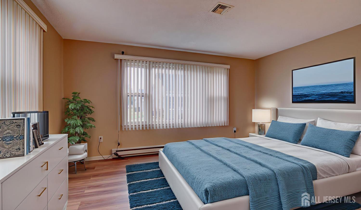 337A Old Nassau Road, Unit A Monroe Township, NJ 08831 - Photo 24 of 39 a bedroom with bed and wooden floor