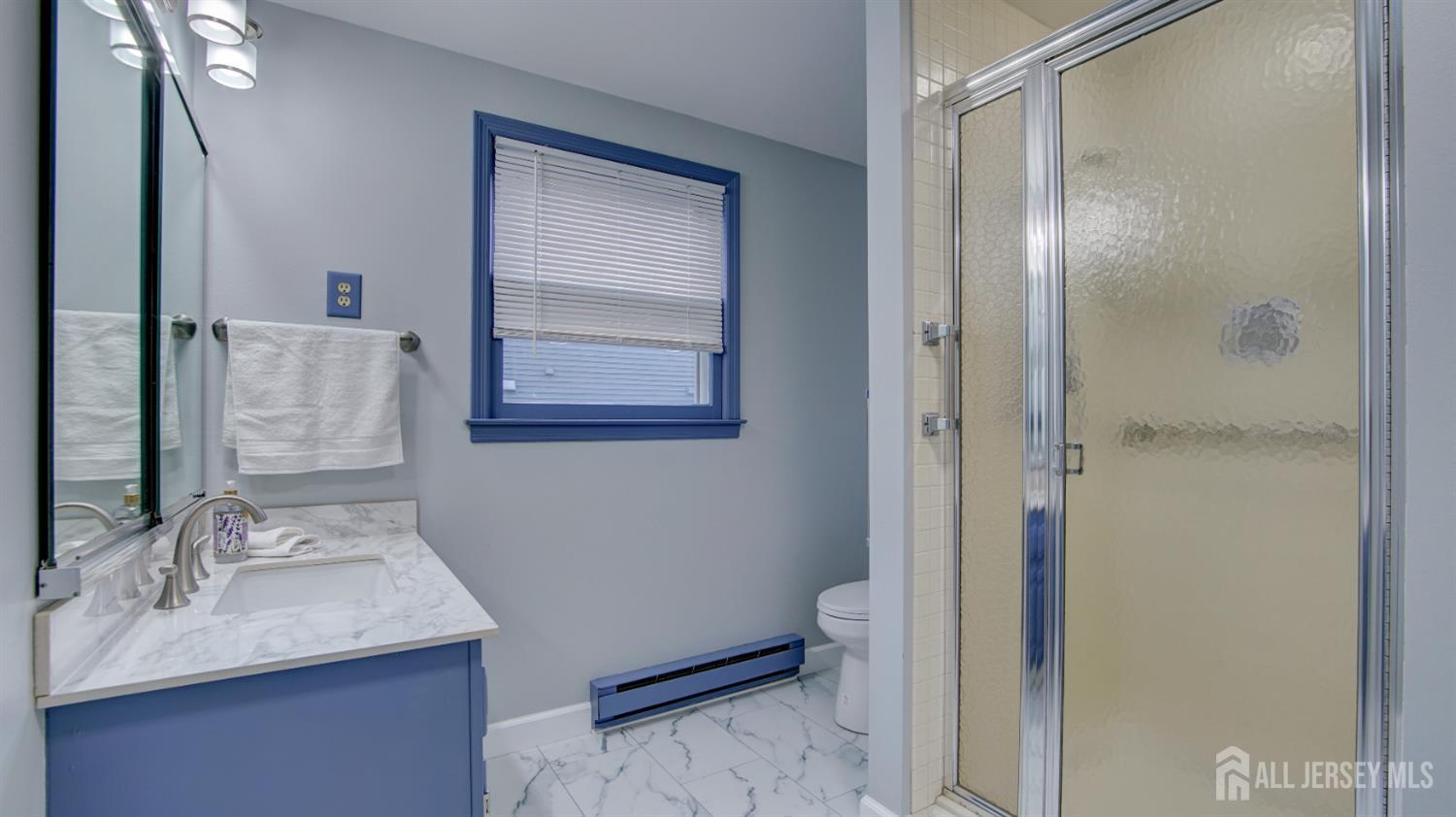 337A Old Nassau Road, Unit A Monroe Township, NJ 08831 - Photo 26 of 39 a bathroom with a sink and a mirror