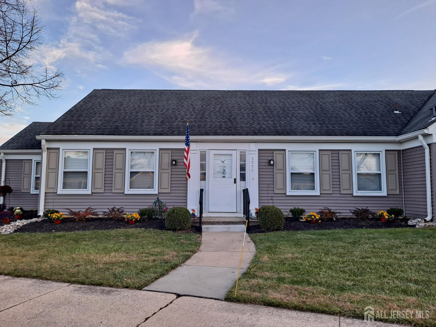 337A Old Nassau Road, Unit A Monroe Township, NJ 08831 - Photo 37 of 39 a view of house with yard and front view of a house