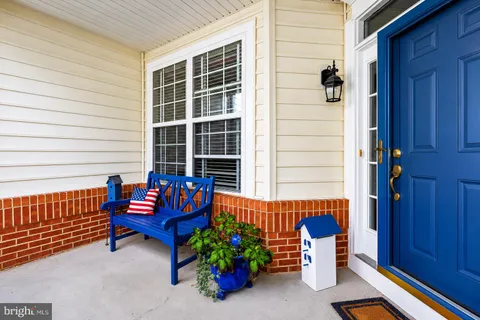 a bench is sitting in front of a door