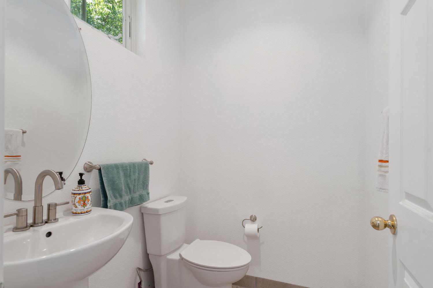 1086 Azalea Lane Concord, CA 94520 - Photo 11 of 18 a bathroom with a sink mirror and toilet