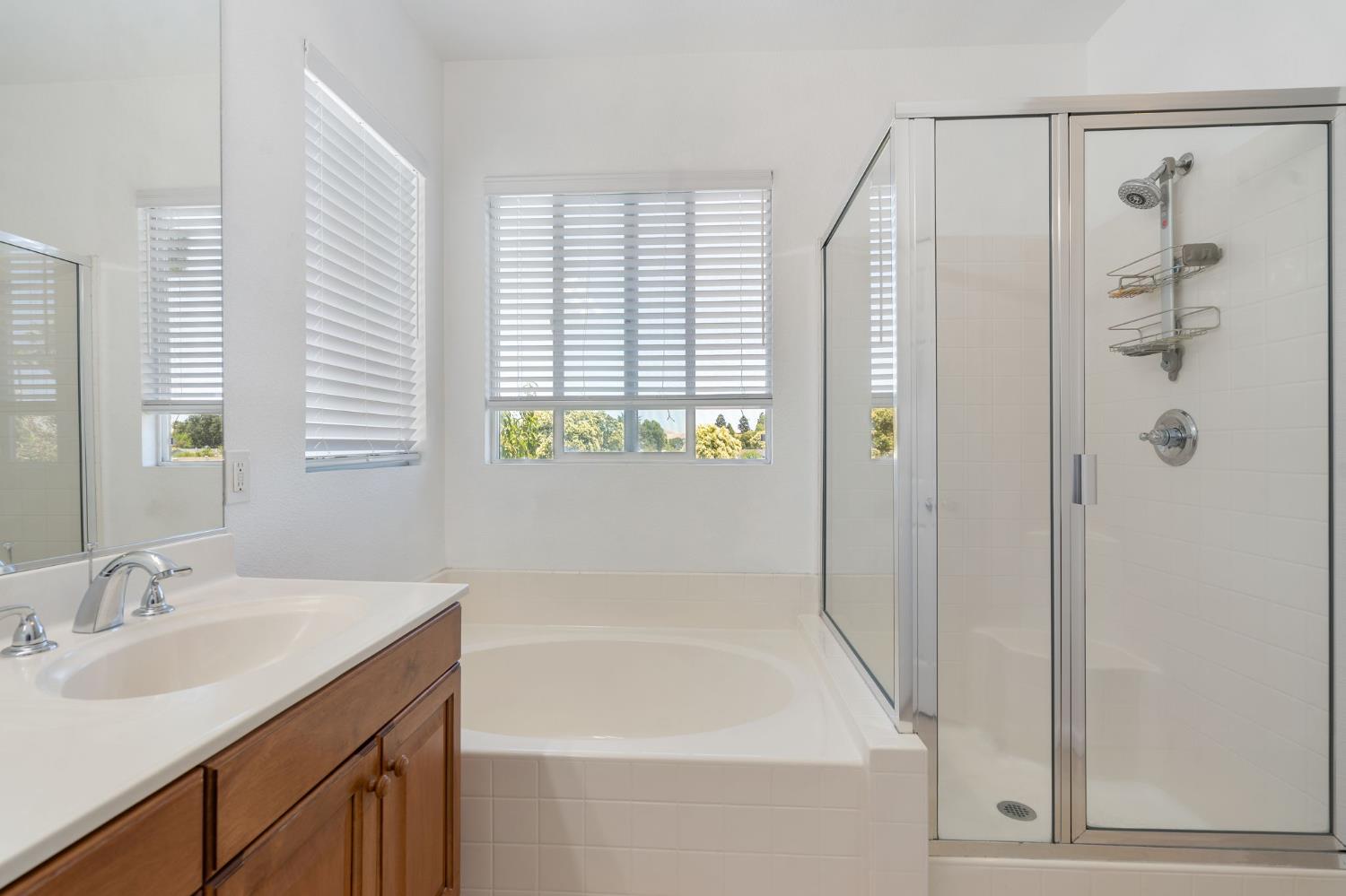 1086 Azalea Lane Concord, CA 94520 - Photo 9 of 18 a bathroom with a tub sink and mirror
