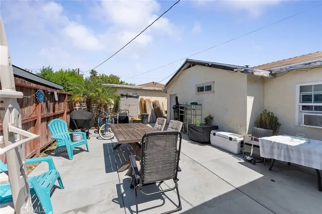 a bed room with a bed and a chair