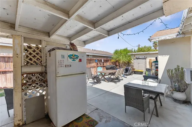 a kitchen with a sink and refrigerator
