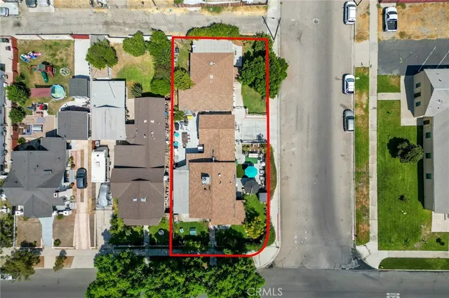 an aerial view of a house with a garden