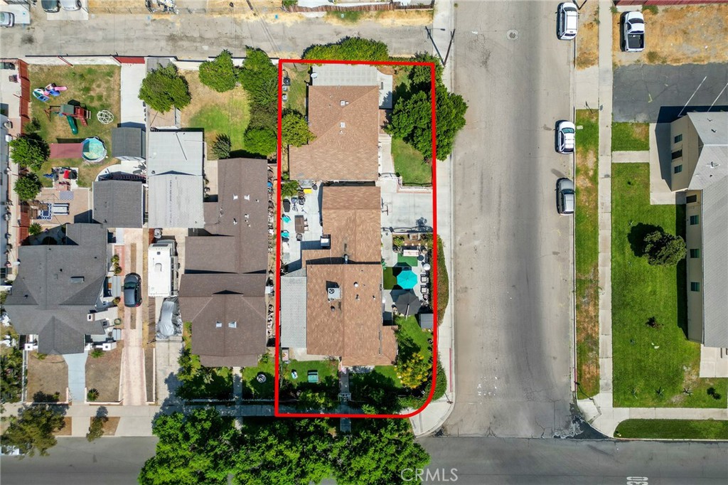 491 East C Street Colton, CA 92324 - Photo 2 of 58 an aerial view of a house with a garden