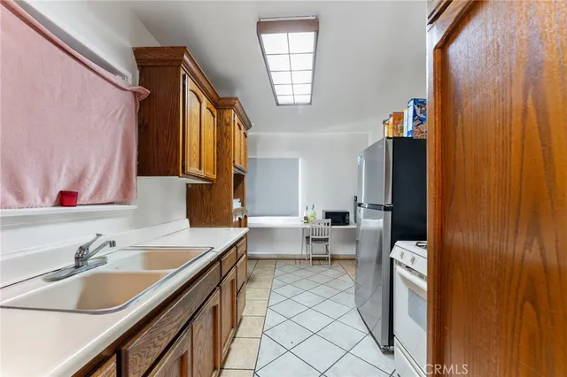 a view of a livingroom with furniture and wooden floor