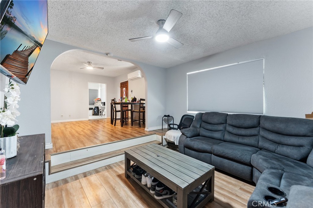 491 East C Street Colton, CA 92324 - Photo 26 of 58 a living room with furniture and wooden floor