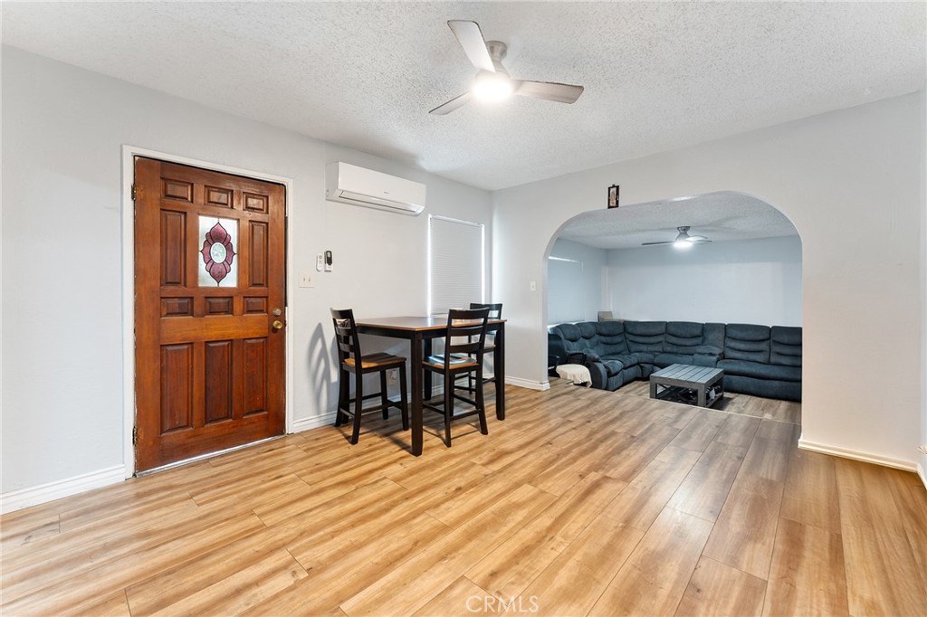 491 East C Street Colton, CA 92324 - Photo 28 of 58 a open kitchen with stainless steel appliances granite countertop a stove and a wooden floors