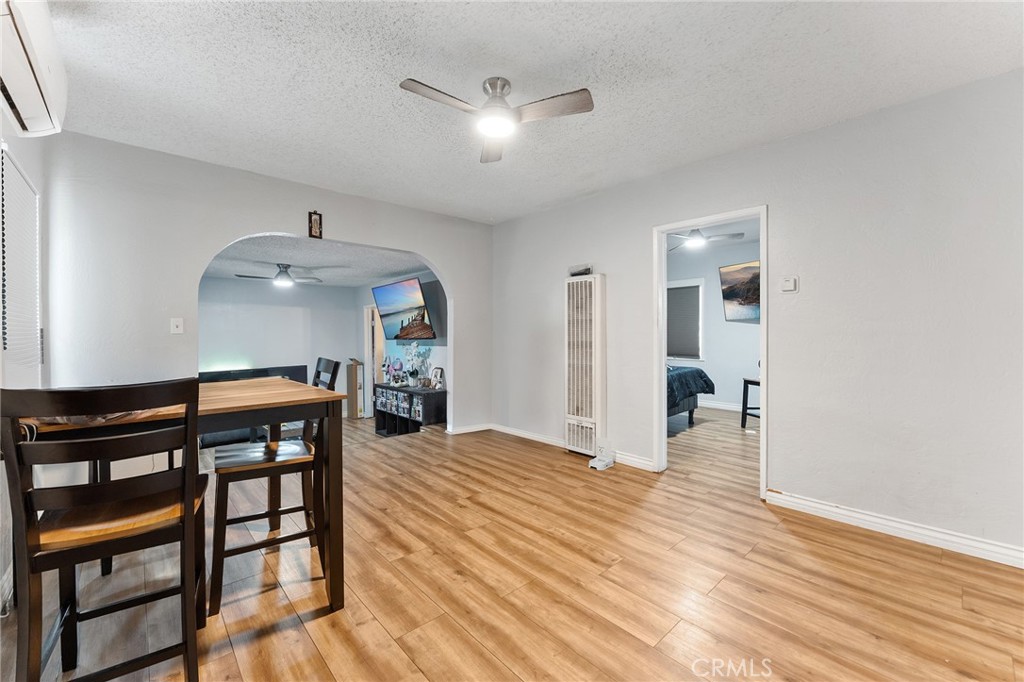 491 East C Street Colton, CA 92324 - Photo 29 of 58 a view of a livingroom with furniture and wooden floor