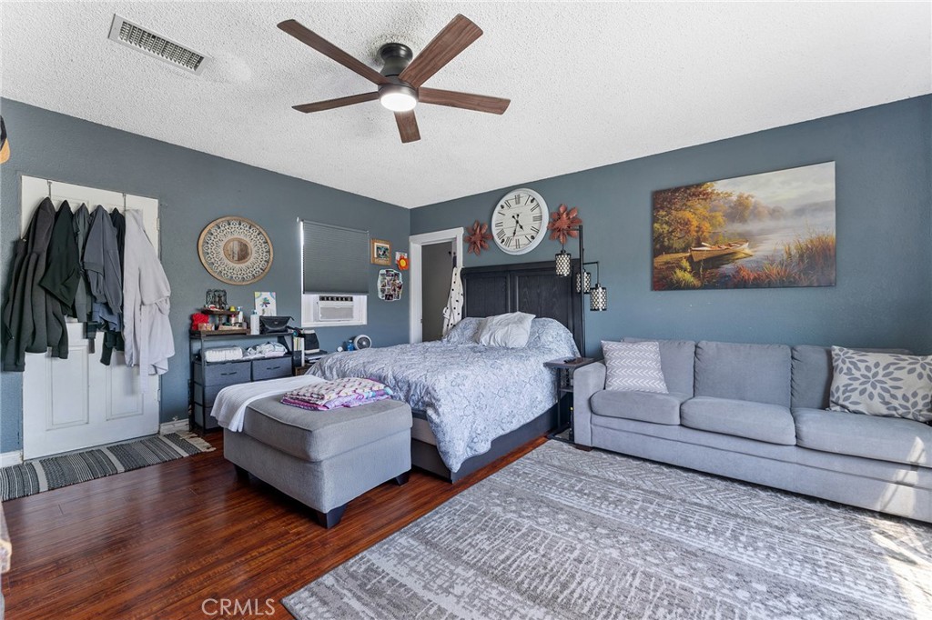 491 East C Street Colton, CA 92324 - Photo 36 of 58 a living room with furniture and a large window