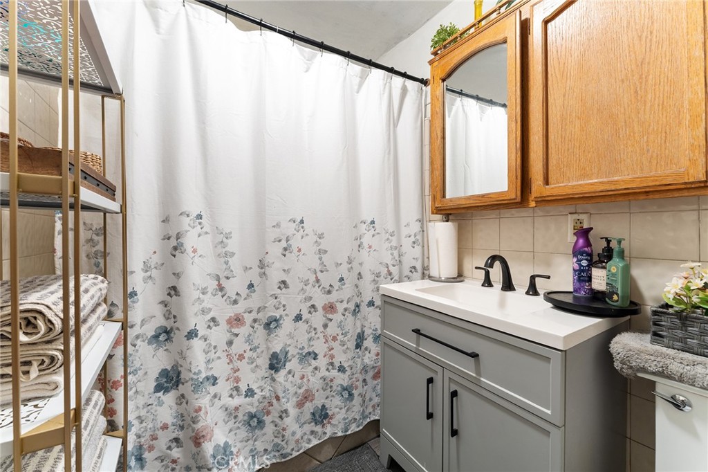 491 East C Street Colton, CA 92324 - Photo 37 of 58 a view of a kitchen with a sink and cabinets