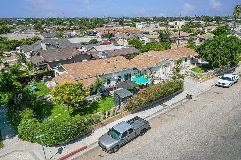 491 East C Street Colton, CA 92324 - Photo 42 of 58 an aerial view of residential houses with outdoor space