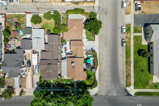 a bedroom with a bed and a book shelf