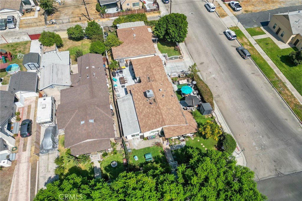 491 East C Street Colton, CA 92324 - Photo 44 of 58 an aerial view of residential house with outdoor space and parking